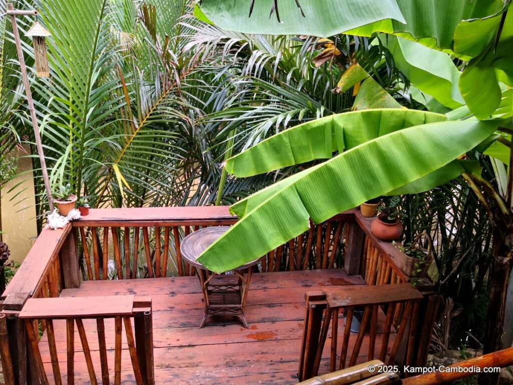 village life kampot cambodia. traditional bungalows.