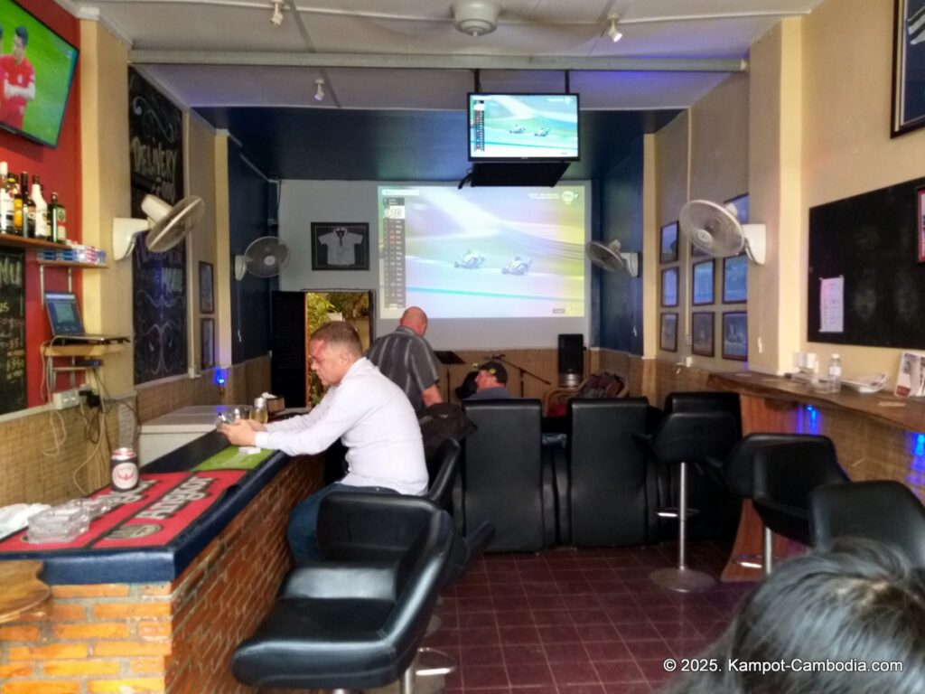 couch potatoes in kampot cambodia. sports bar.