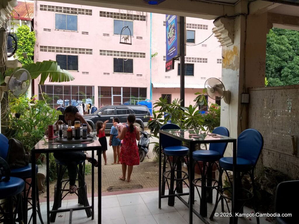 couch potatoes in kampot cambodia. sports bar.