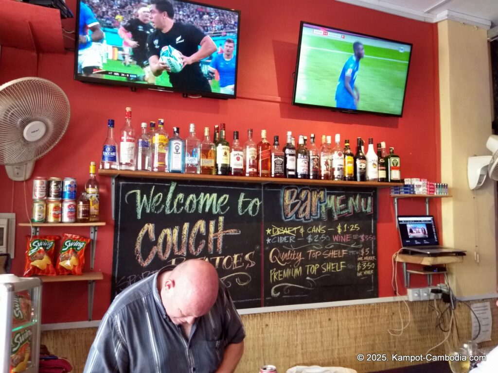 couch potatoes in kampot cambodia. sports bar.