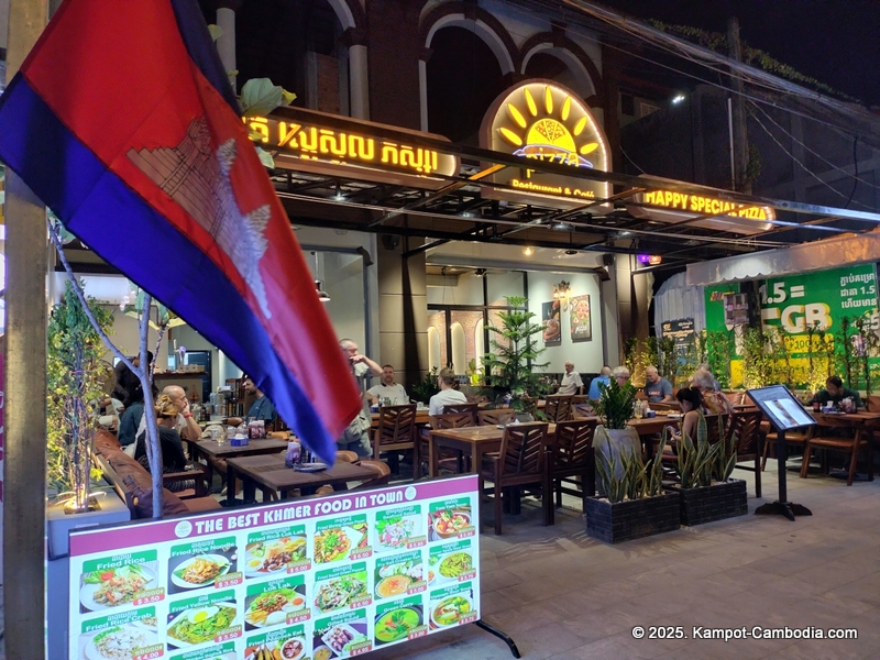 Happy special pizza in Kampot, Cambodia.