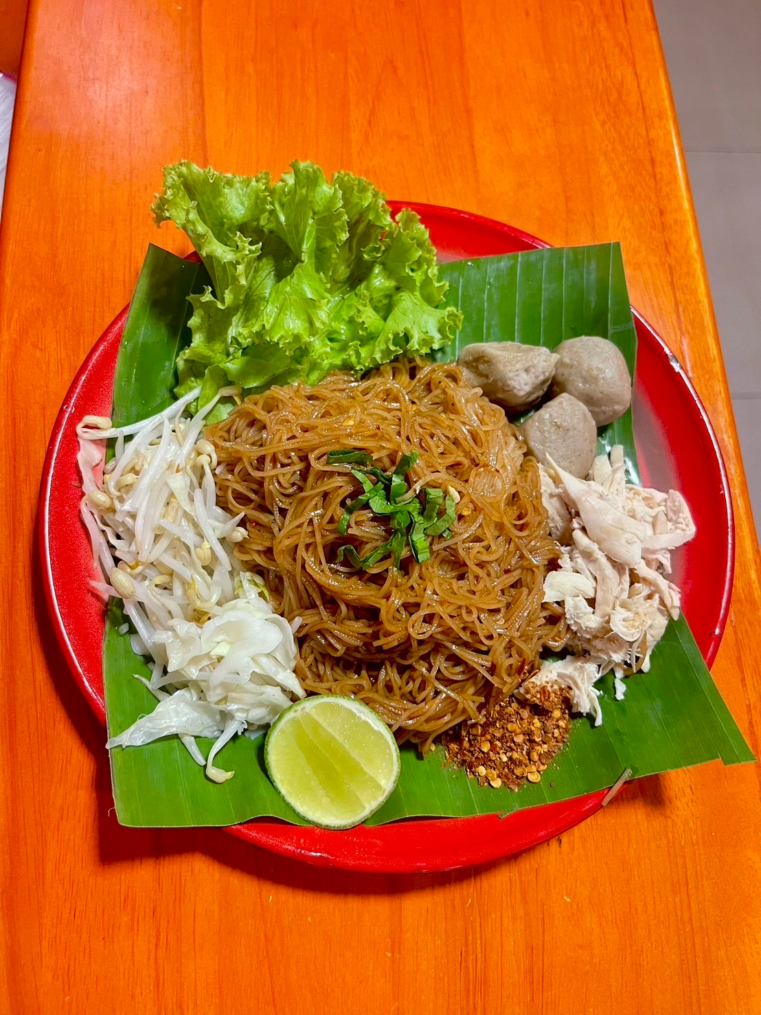 Chicken dry noodles with special sauce.