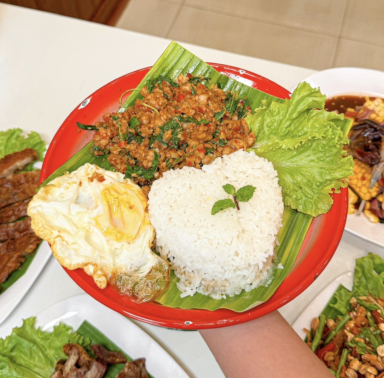 Pad Ka Phrao chicken / pork / beef /seafood / vegetarian.