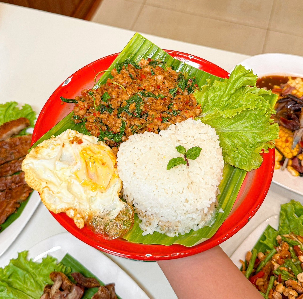Pad Ka Phrao chicken / pork / beef /seafood / vegetarian.