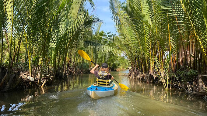 Kayaking Green Cathedral in Kampot, Cambodia. Kayak tours in the tributary of the Kampot River.