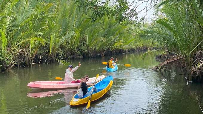 Kayaking Green Cathedral in Kampot, Cambodia. Kayak tours in the tributary of the Kampot River.