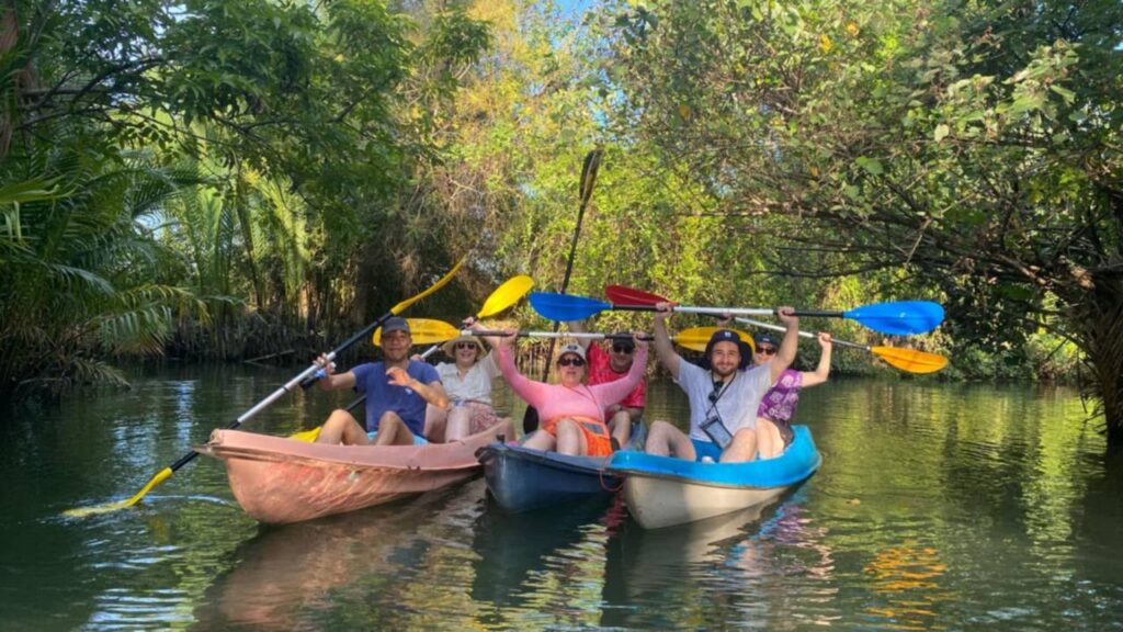 Kayaking Green Cathedral in Kampot, Cambodia. Kayak tours in the tributary of the Kampot River.
