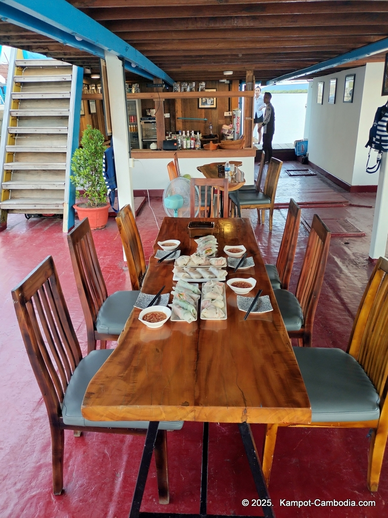 the bay boat. kampot, cambodia. daily cruises on the kampot river.