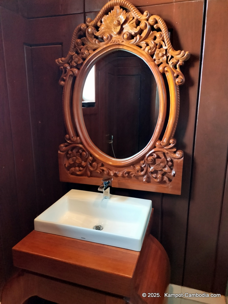 Heritage Village in Kampot, Cambodia. Wooden houses near the Kampot River.