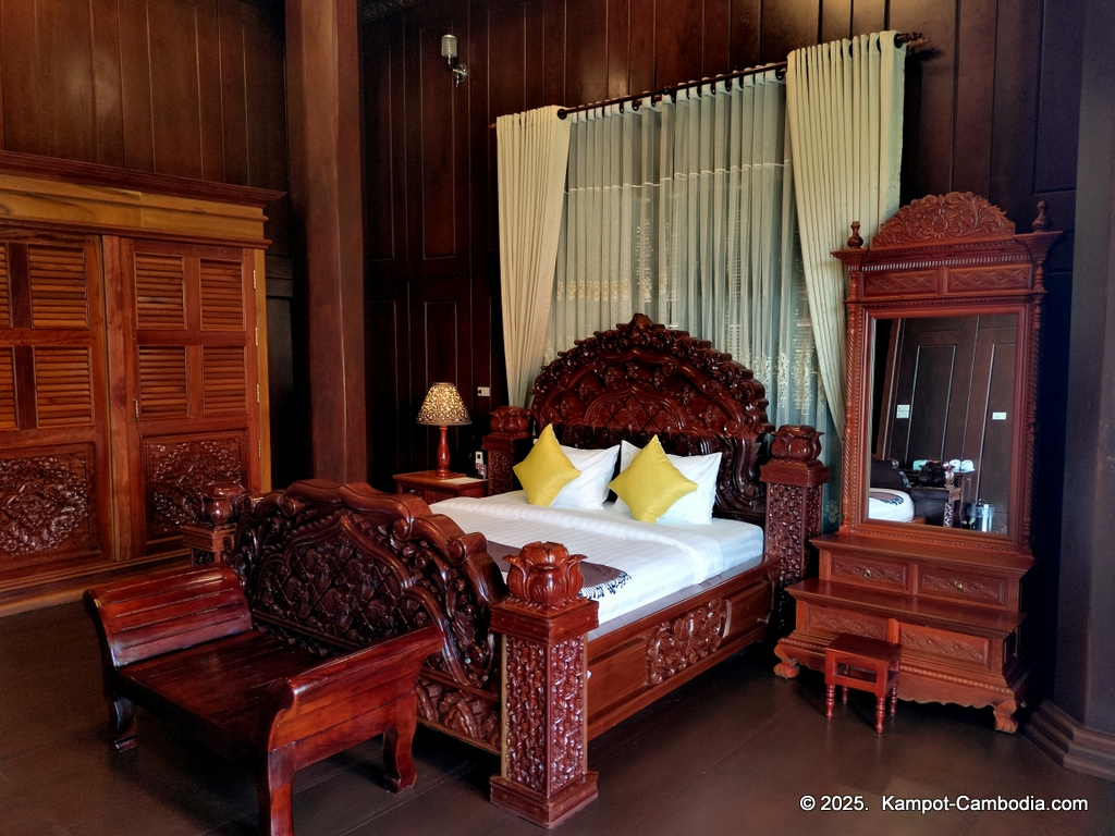 Heritage Village in Kampot, Cambodia. Wooden houses near the Kampot River.