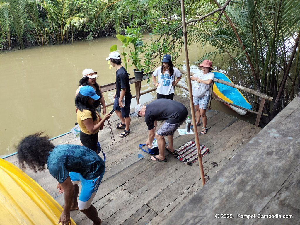 Kayaking Green Cathedral in Kampot, Cambodia. Kayak tours in the tributary of the Kampot River.