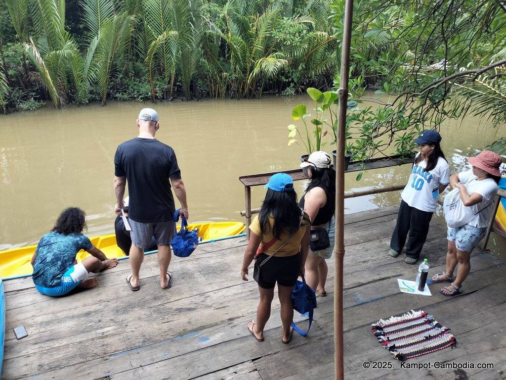 Kayaking Green Cathedral in Kampot, Cambodia. Kayak tours in the tributary of the Kampot River.