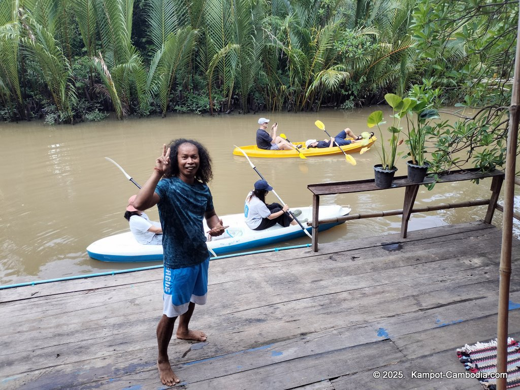 Kayaking Green Cathedral in Kampot, Cambodia. Kayak tours in the tributary of the Kampot River.