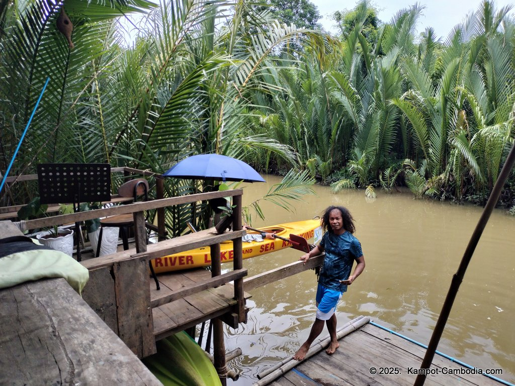 Kayaking Green Cathedral in Kampot, Cambodia. Kayak tours in the tributary of the Kampot River.