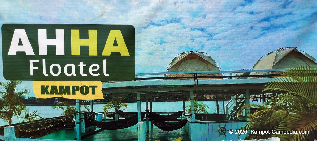 AHHA Floatel Library, hammocks, tents, cafe, kayaks on the Kampot River in Cambodia.