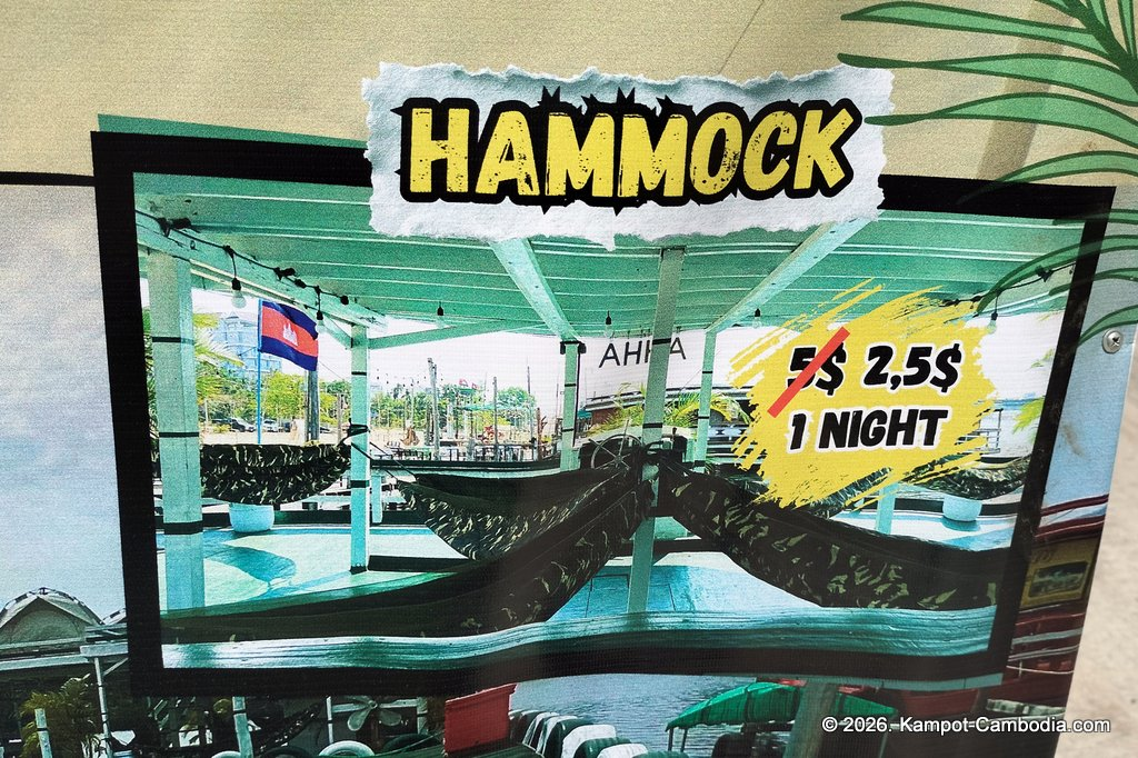 AHHA Floatel Library, hammocks, tents, cafe, kayaks on the Kampot River in Cambodia.