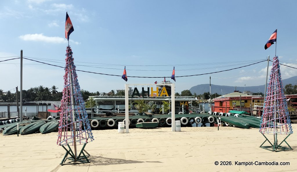 AHHA Floatel Library, hammocks, tents, cafe, kayaks on the Kampot River in Cambodia.