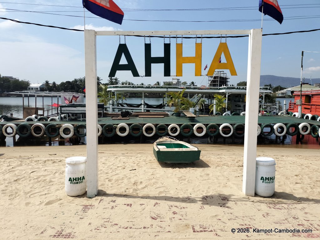 AHHA Floatel Library, hammocks, tents, cafe, kayaks on the Kampot River in Cambodia.