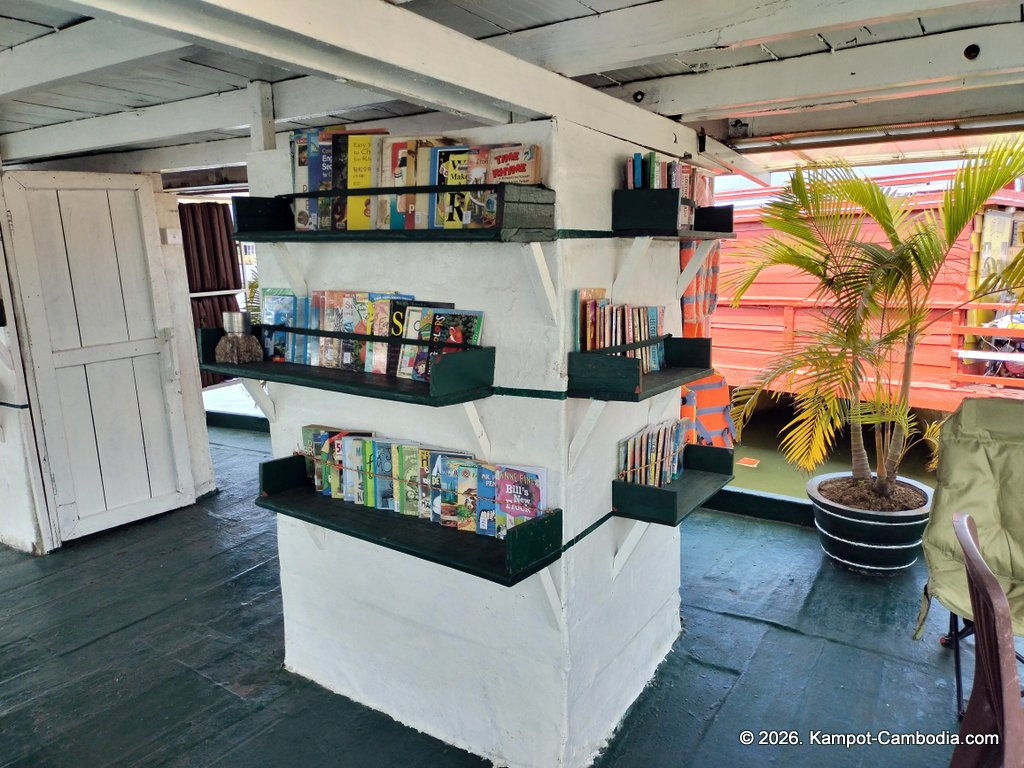 AHHA Floatel Library, hammocks, tents, cafe, kayaks on the Kampot River in Cambodia.