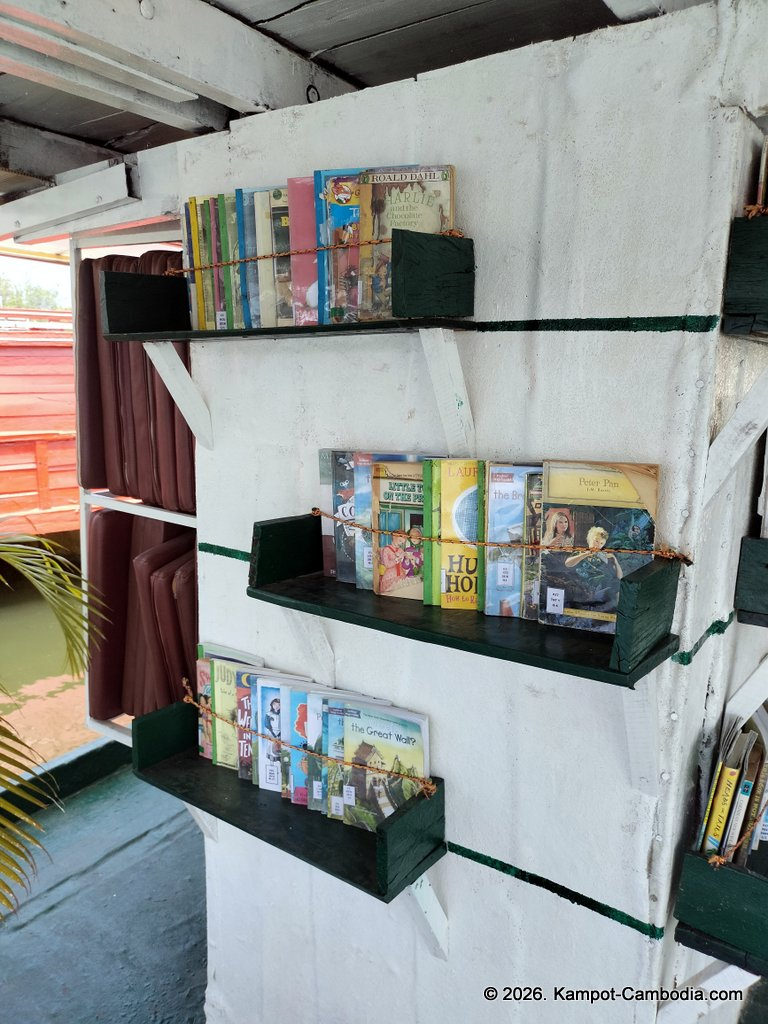 AHHA Floatel Library, hammocks, tents, cafe, kayaks on the Kampot River in Cambodia.