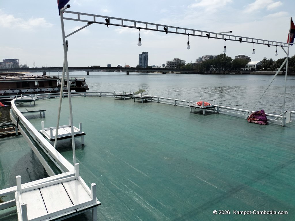 AHHA Floatel Library, hammocks, tents, cafe, kayaks on the Kampot River in Cambodia.