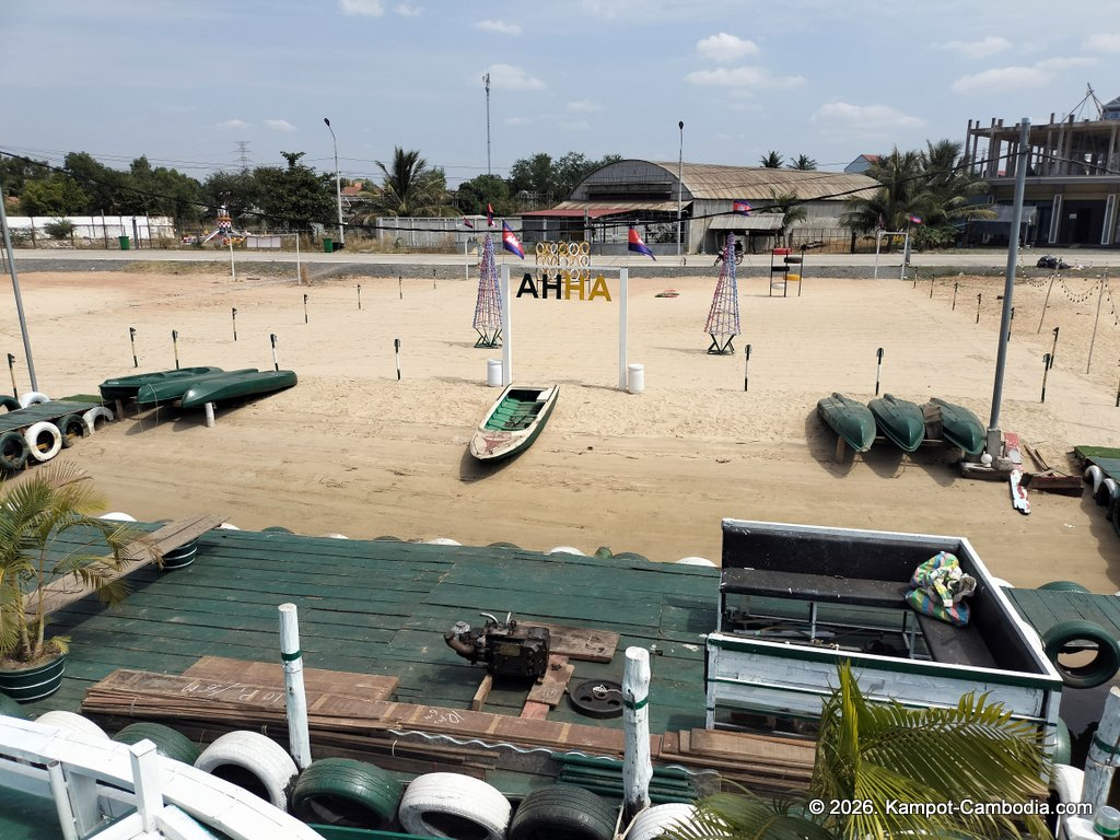 AHHA Floatel Library, hammocks, tents, cafe, kayaks on the Kampot River in Cambodia.