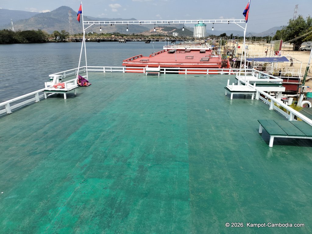 AHHA Floatel Library, hammocks, tents, cafe, kayaks on the Kampot River in Cambodia.