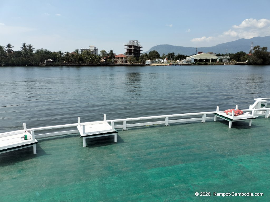 AHHA Floatel Library, hammocks, tents, cafe, kayaks on the Kampot River in Cambodia.