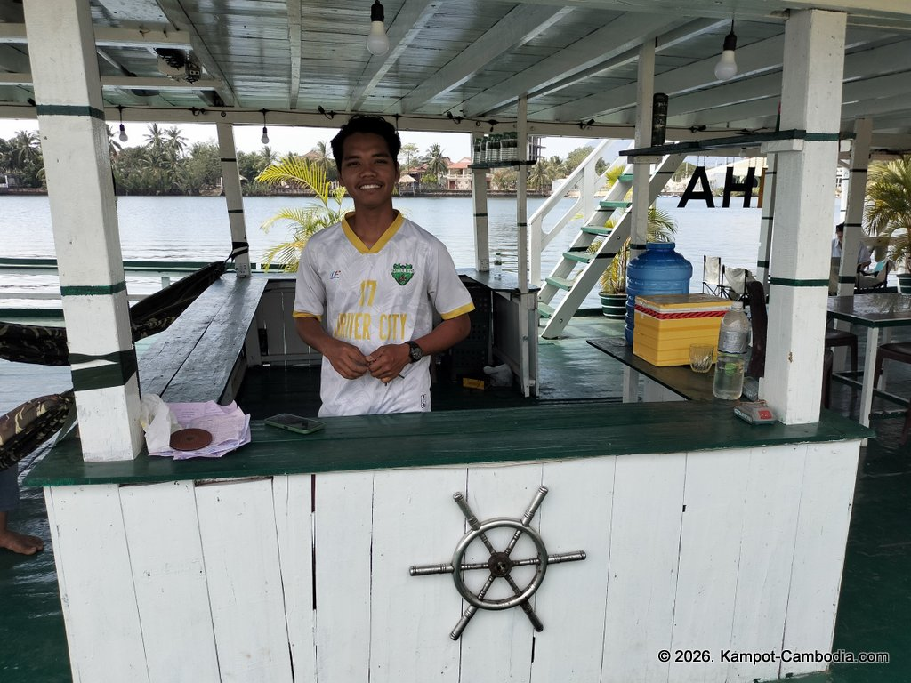 AHHA Floatel Library, hammocks, tents, cafe, kayaks on the Kampot River in Cambodia.