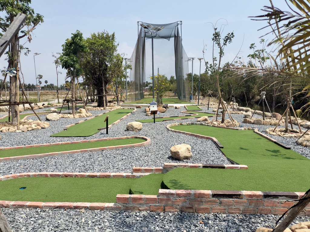 komsan resort on fish island in kampot, cambodia. mini golf and driving range.