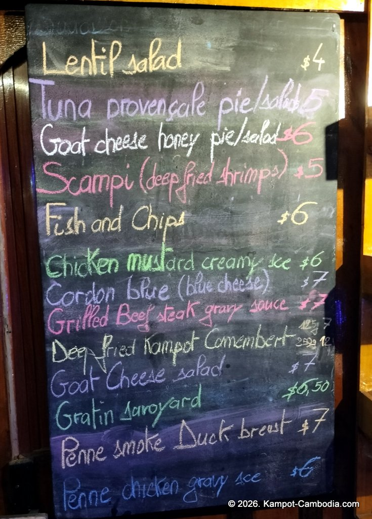 Coexist French Riverboat restaurant on the Kampot River in Cambodia.