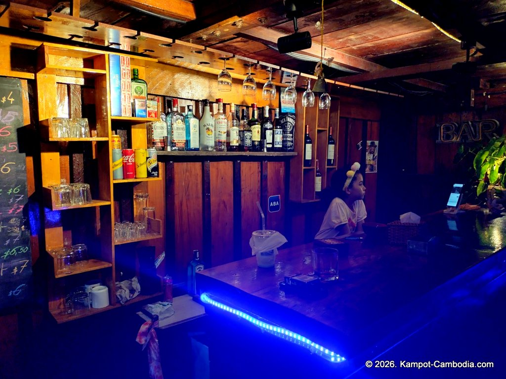 Coexist French Riverboat restaurant on the Kampot River in Cambodia.