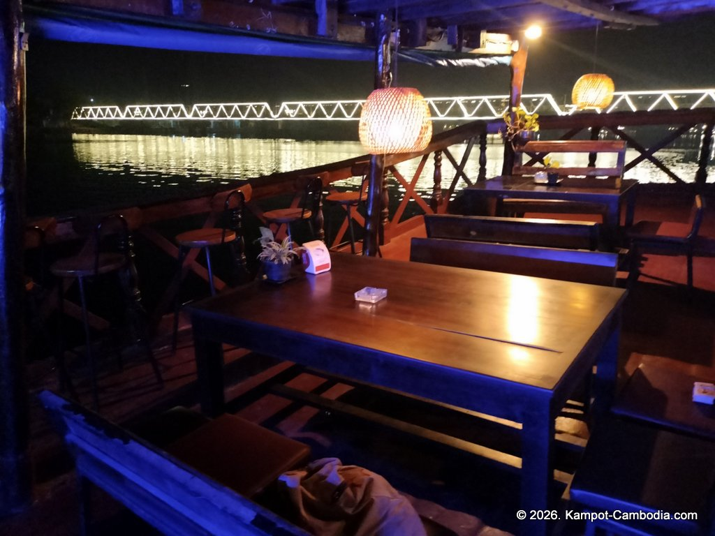 Coexist French Riverboat restaurant on the Kampot River in Cambodia.