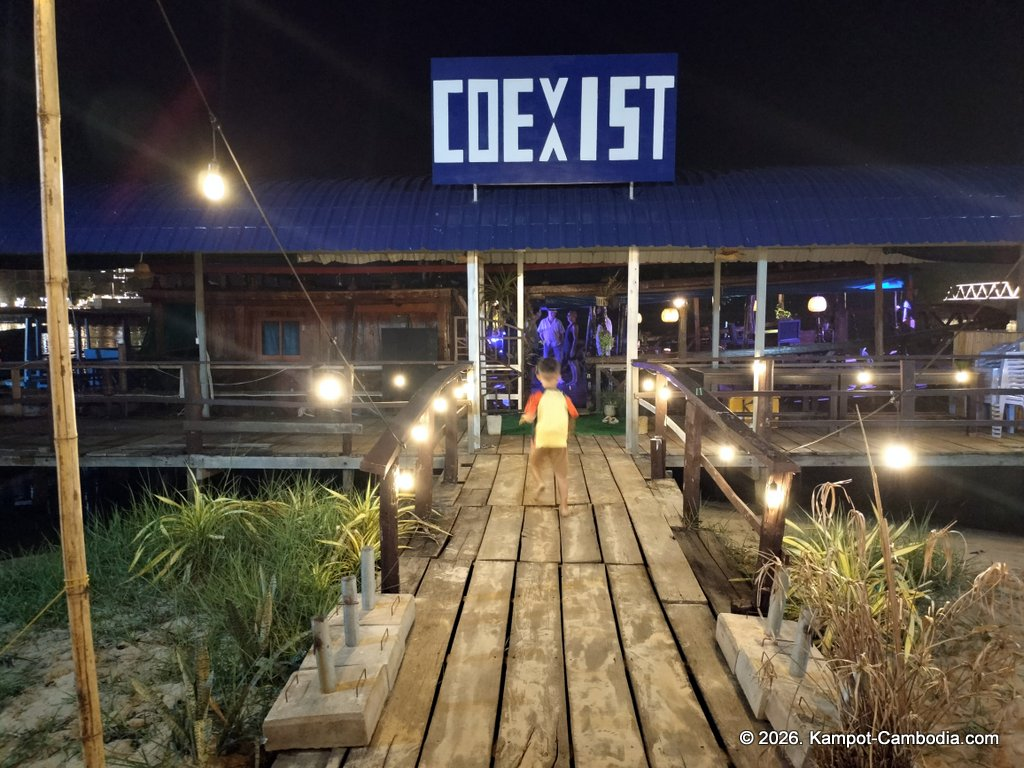 Coexist French Riverboat restaurant on the Kampot River in Cambodia.