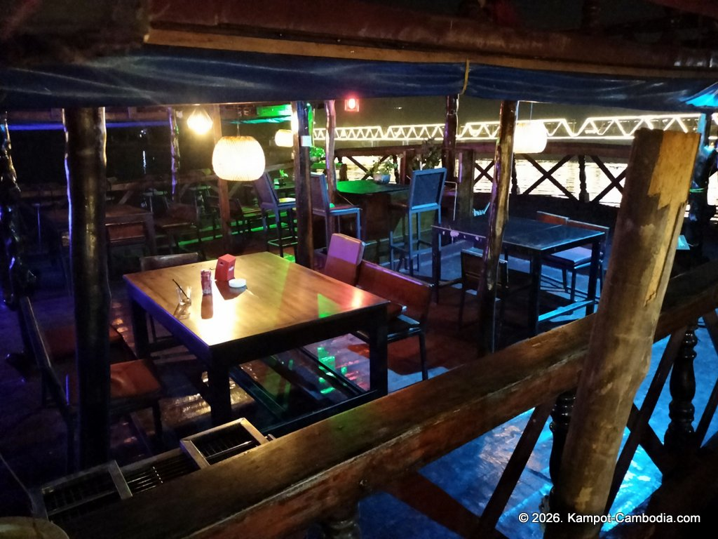 Coexist French Riverboat restaurant on the Kampot River in Cambodia.