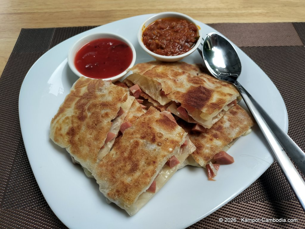 Ju1 Roti Hub in Kampot, Cambodia. Indian and Malaysian rotis by the Kampot River.